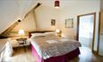 Double bedroom at holiday cottage, The Garlic Farm, Newchurch, self-catering
