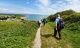 Group walking along coast at the Isle of Wight Walking Festival, what's on