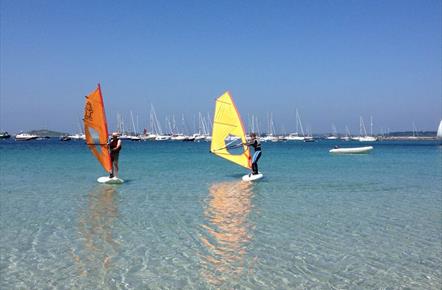 Windsurfers on the water
