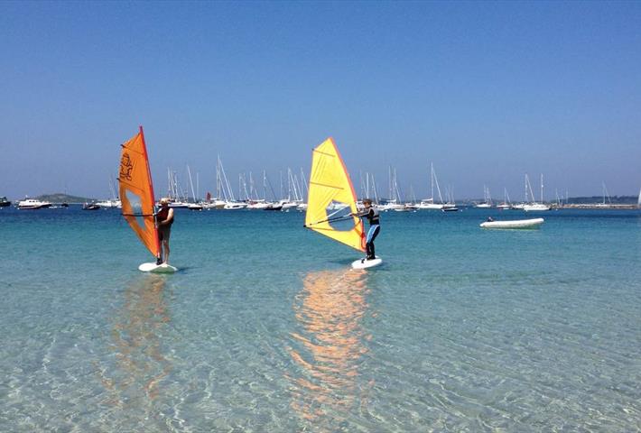 Windsurfers on the water