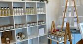 Scilly Scent products on shelving in shop