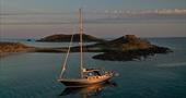 50 foot Bermudan cutter 'Jekamanzi' - sunset aerial