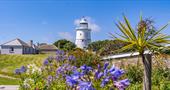 A white lighthouse on St. Agnes