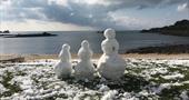 Snowmen on Porthcressa bank