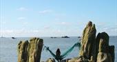 Sea view from fishing net hammock