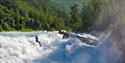 Person going over the Prestfossen zipline - Aktiv i Lom