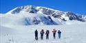 Gruppe på topptur på ski med Fyrst og Fremst