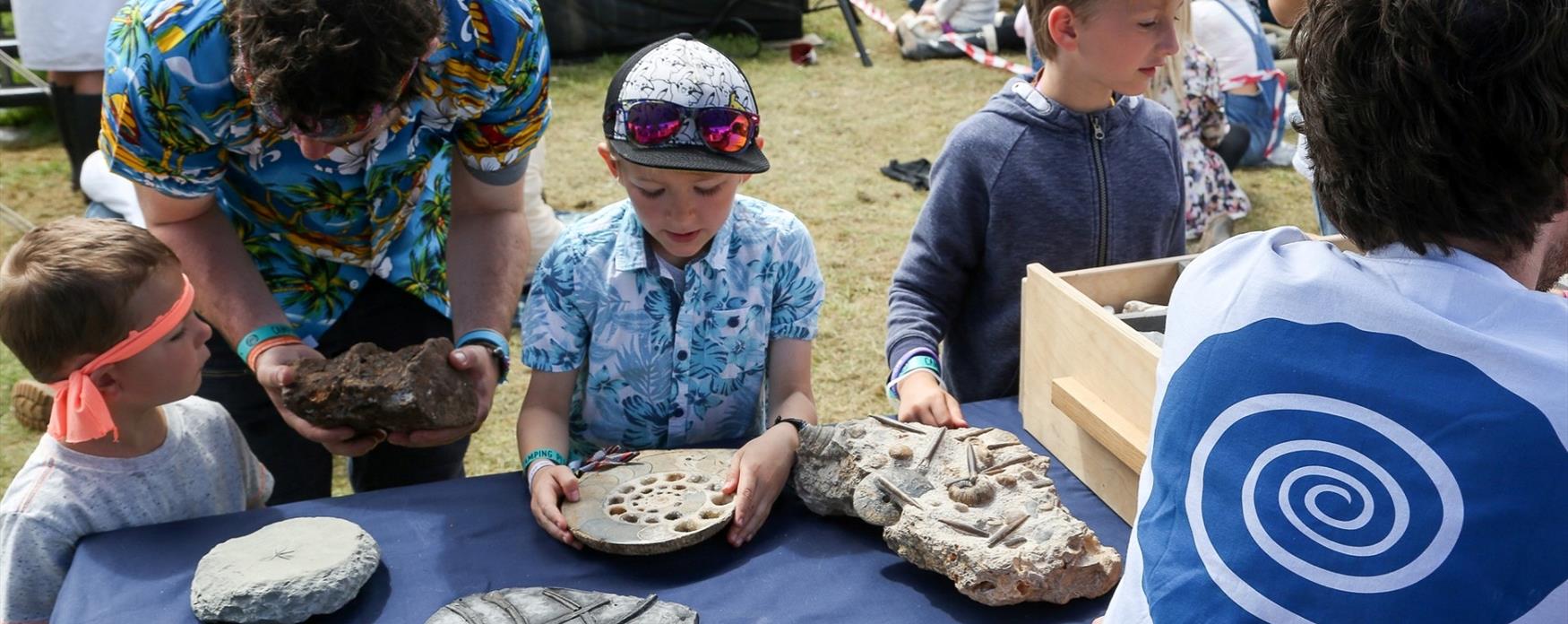 Discovering fossils at Camp Bestival in Dorset