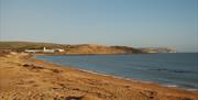 Picture of a map with meeting point, Picture of a sandy beach and picture of a rocky beach