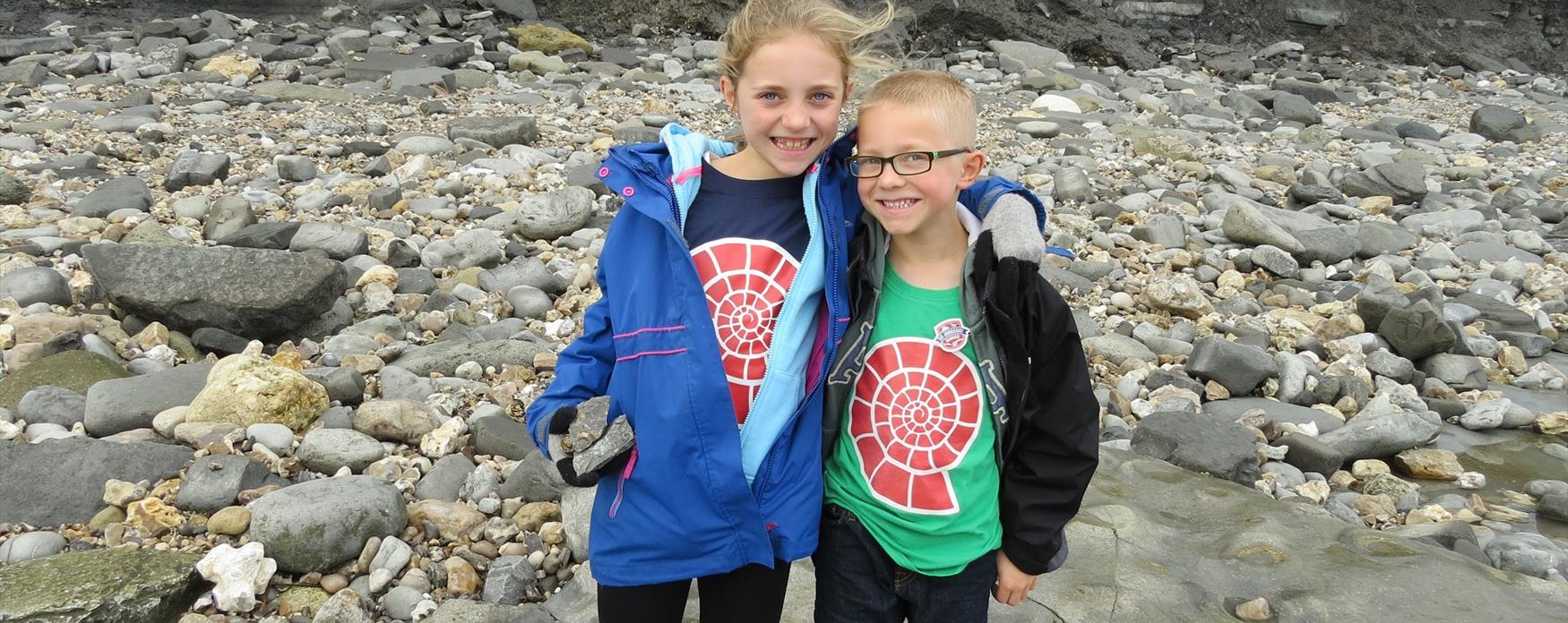 young palaeontologists on the beach at Lyme Regis.