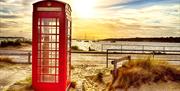 The iconic red phone box at Shell Bay, Studland.