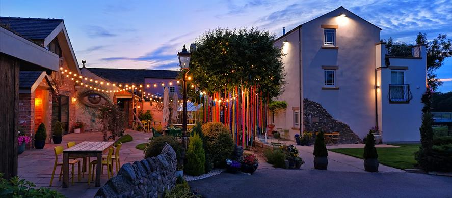 Green houses at Cartford Inn