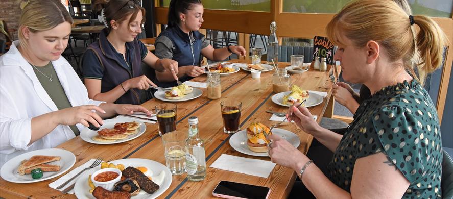 Ladies enjoy a coffee and a catch up in the cafe.