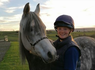 Care for a pony - young person with horse image