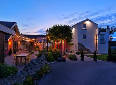 Green houses at Cartford Inn