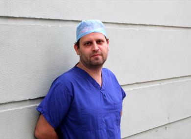 Adam Kay in theatre scrubs