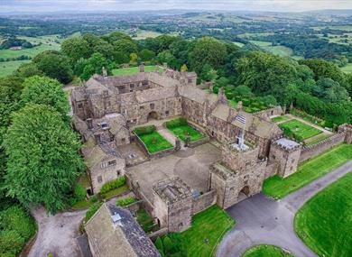 Image of Hoghton Tower from the air, surrounded by the Lancashire countryside.