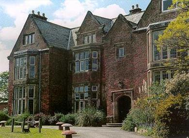 Outdoor picture of Heskin Hall, off its driveway.  