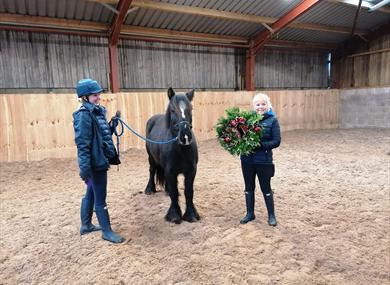 Wreath making image with horse and wreath