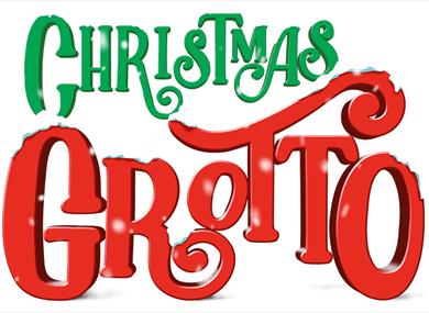 Christmas grotto logo in green and red with snow falling on the words.