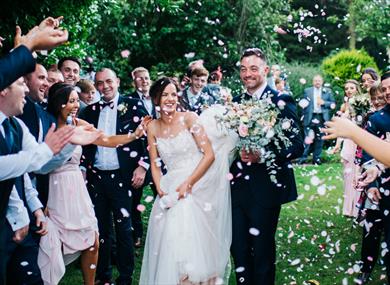 Couple celebrating with friends at Shireburn Arms