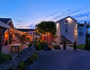 Green houses at Cartford Inn