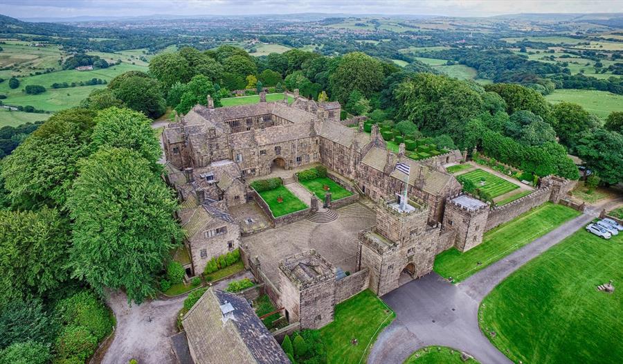 Image of Hoghton Tower from the air, surrounded by the Lancashire countryside.