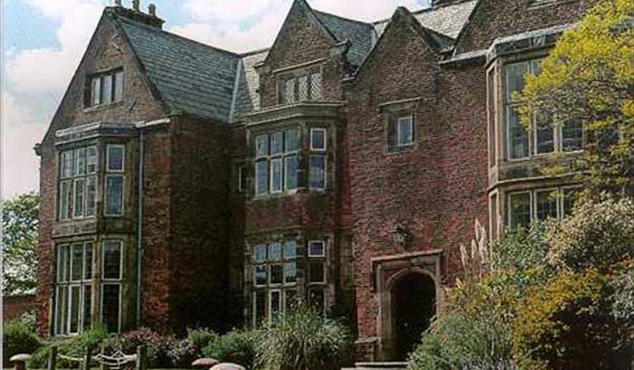 Outdoor picture of Heskin Hall, off its driveway.