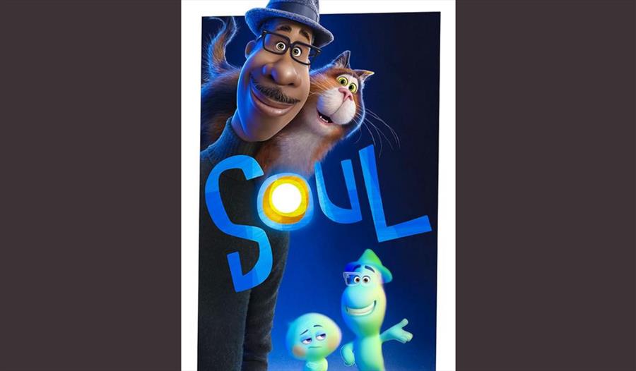 Film poster of a gentleman with a cat on his shoulder.  A couple of curious green characters stand next to them.