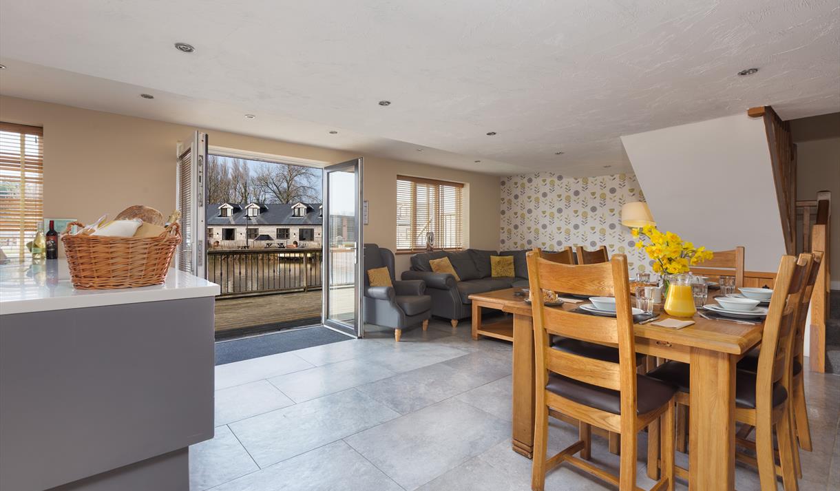 Open living space decorated in orange and white