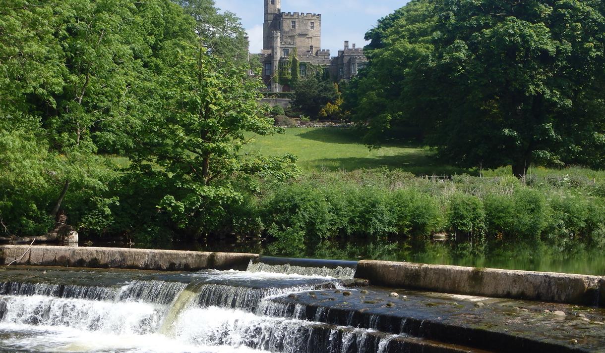 A view towards Hornby Castle from the weir over the River Wenning. Photograph by Forest of Bowland AONB.