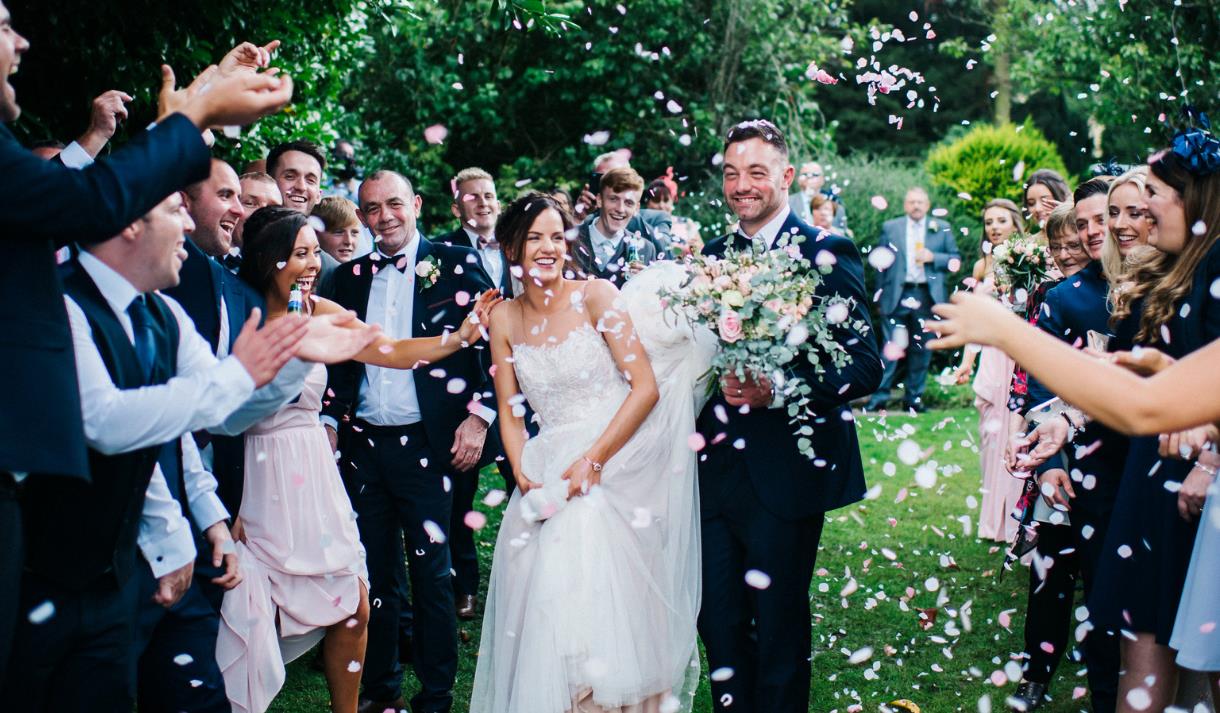 Couple celebrating with friends at Shireburn Arms