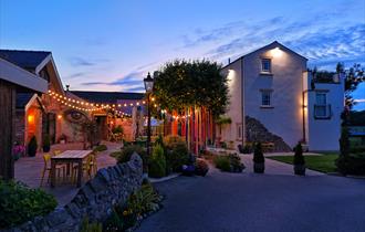 Green houses at Cartford Inn