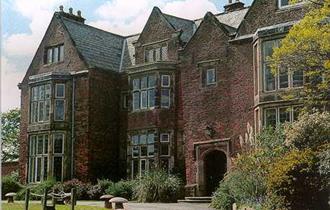 Outdoor picture of Heskin Hall, off its driveway.