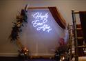 23 Winckley Square venue is dressed for a wedding reception with a neon light saying 'Happily ever after'.