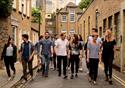 A dozen performers walk through the streets of Lancaster city.  Image credit Eliza Brown