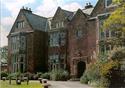 Outdoor picture of Heskin Hall, off its driveway.