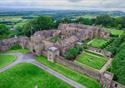 Image of Hoghton Tower from the air, surrounded by the Lancashire countryside.