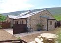 Roosters Rest outside view, surrounded by Lancashire countryside.