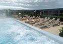 Rooftop sunbeds with pool