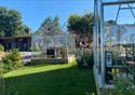 Green houses at Cartford Inn