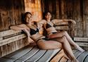 Friends in a sauna relaxing