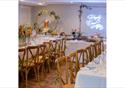 Dining area set up for large wedding breakfast