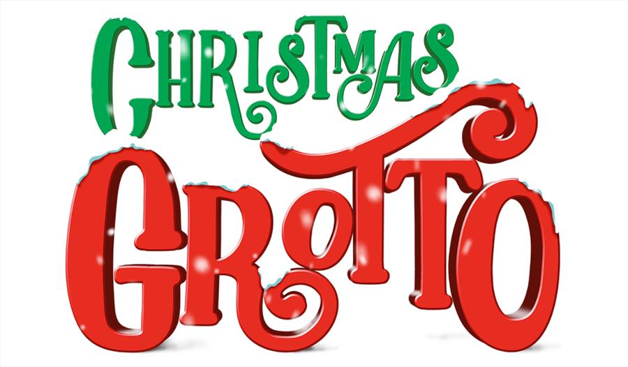 Christmas grotto logo in green and red with snow falling on the words.