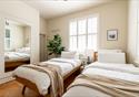 Comfortable single beds at The Gatehouse.