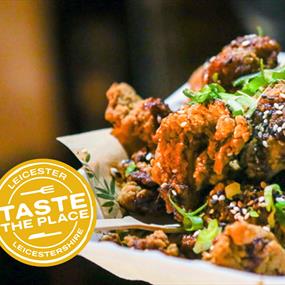 food and taste the place logo