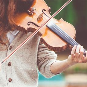 Person playing a violin