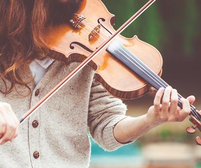 Person playing a violin