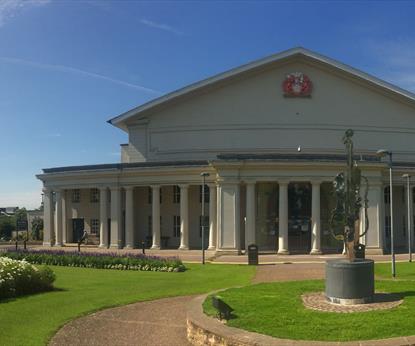 de montfort hall exterior with blue sky 