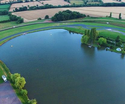 Racing track around a lake in the countryside. 